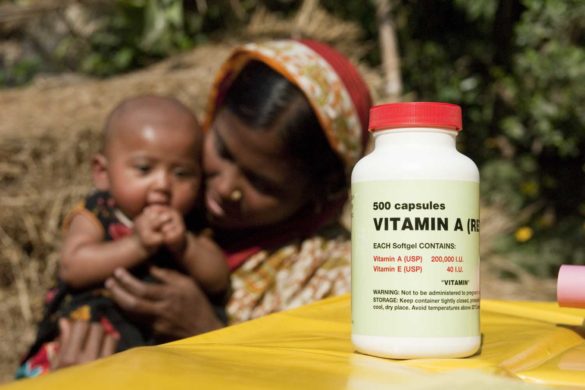 Ripa (25), and her child Aysa (4 Months) posed for photograph while they come for vaccination at Tarapur Saner Chor, Astadhor Union, Mymensingh, Bangladesh on 21 December 2009. Bangladesh Government runs immunization project in Mymensingh supported by UNICEF.